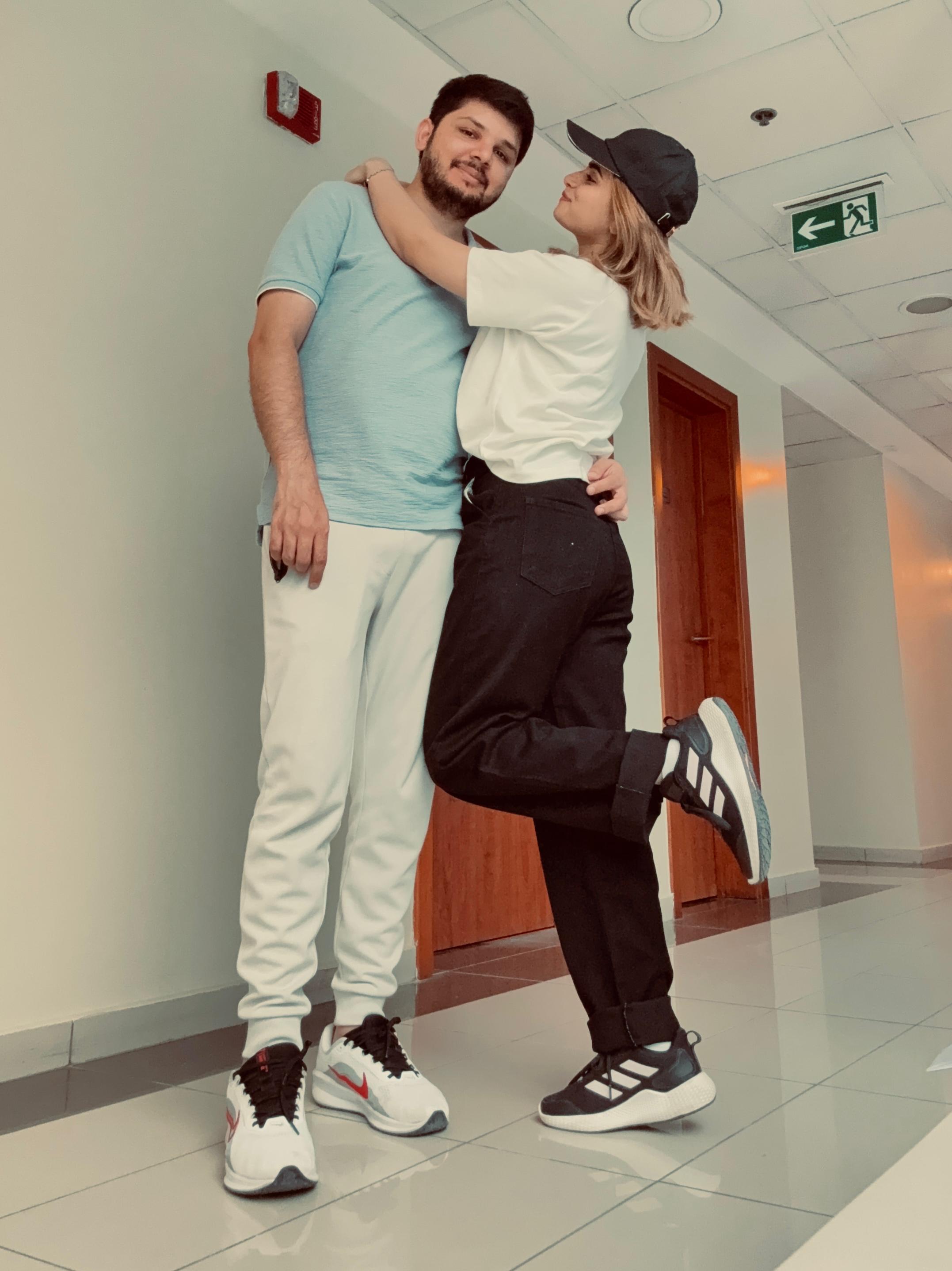 Sunny and Ayesha in courtyard